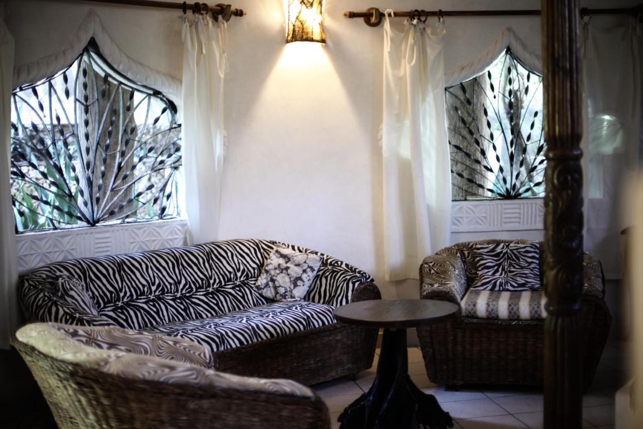 Coconut Village Beach Resort เดียนีบีช ภายนอก รูปภาพ