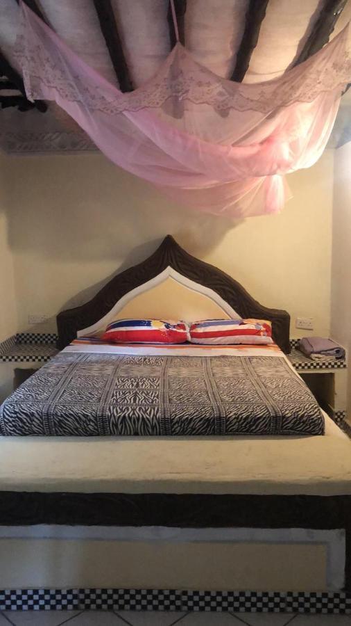 Coconut Village Beach Resort เดียนีบีช ภายนอก รูปภาพ